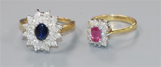 An 18ct gold, sapphire and diamond cluster ring and an 18ct gold, emerald-cut ruby and diamond cluster ring.